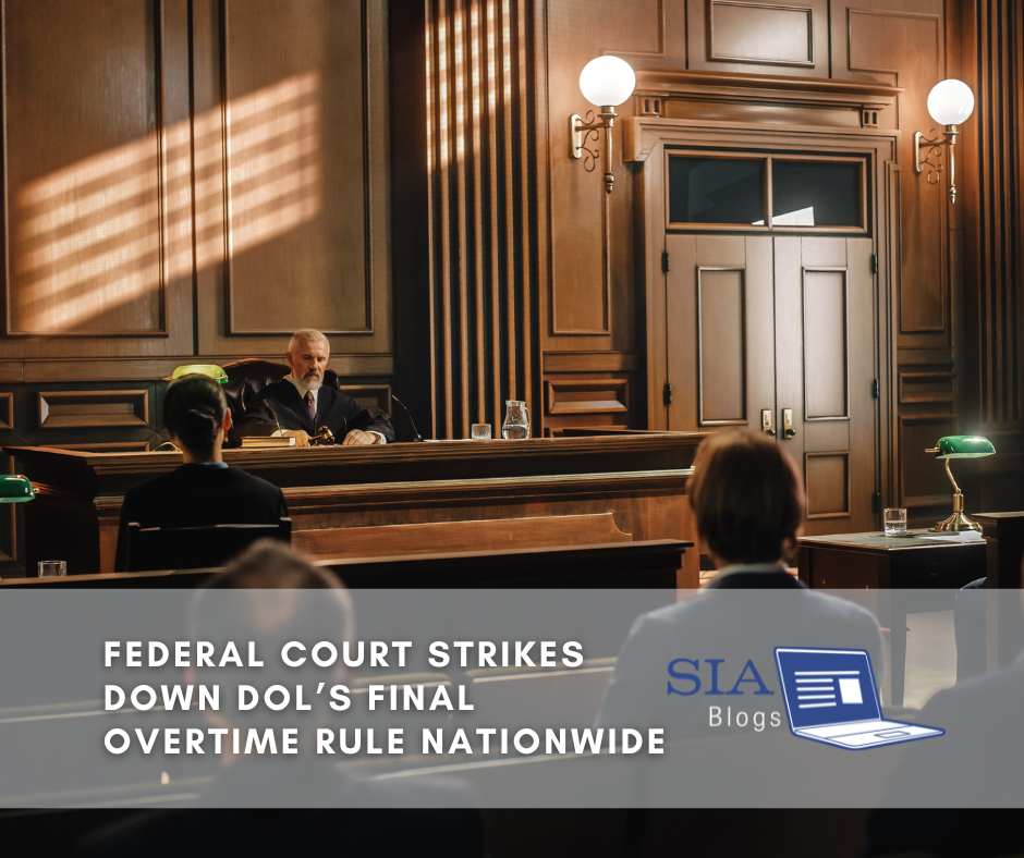 A judge presides over a courtroom, with two individuals seated in the foreground. The scene represents the legal setting for the federal court striking down the Department of Labor’s final overtime rule.